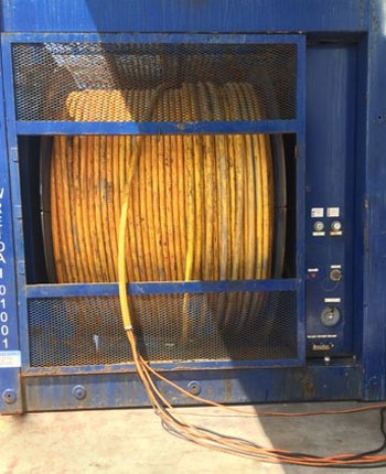 Spooled cable used for milestone continuity measurement