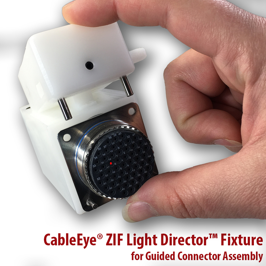 ZIF fixture shown with connector to be assembled being locked in place, and a pin location illuminated.