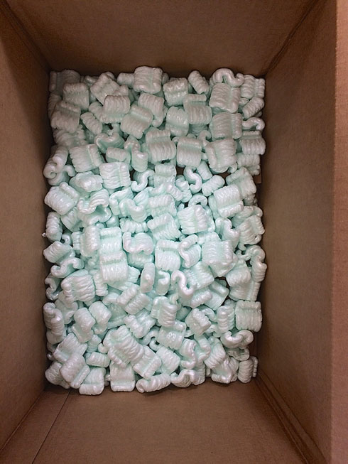 Place 2 inches of padding in base Peanuts shown