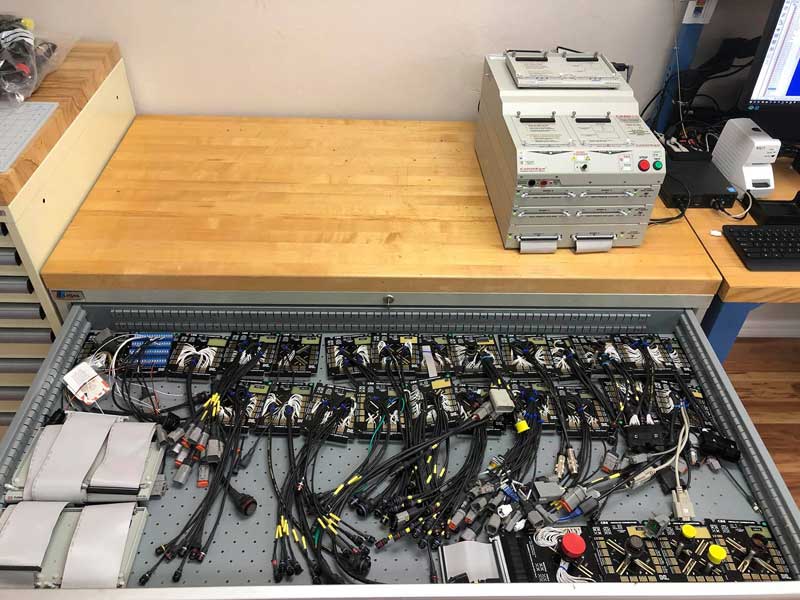 A CableEye HiPot test with array of test interface fixtures.